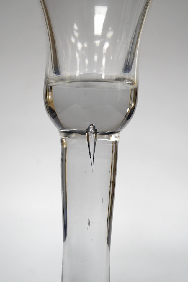 A heavy plain stem wine glass, circa 1740, bell shaped bowl, folded foot, 18cm high. Condition - good
